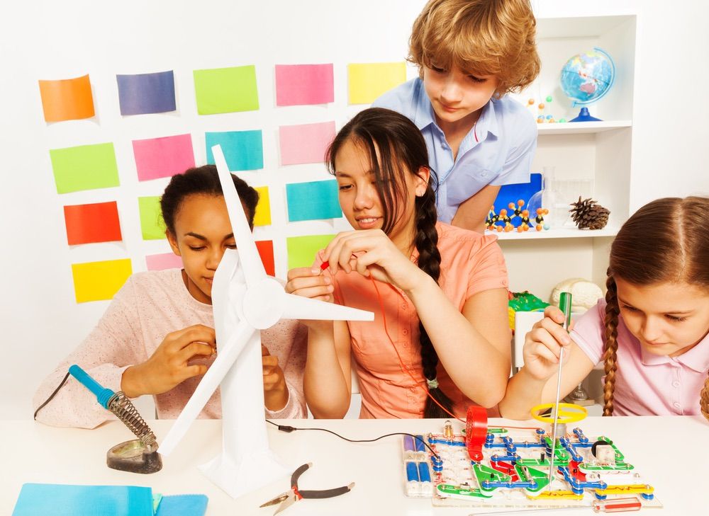 Kids studying the processes of energy transmission