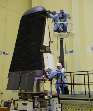 Technicians do final tests on the European Space Agency's Intermediate eXperimental Vehicle (IXV) ahead of its expected launch in November 2014.