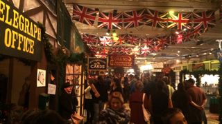 Herds of Dickens Fair attendees wander its halls.