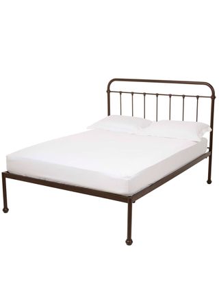 Black coated steel bed with softly curved headboard and white mattress and 2 white pillows