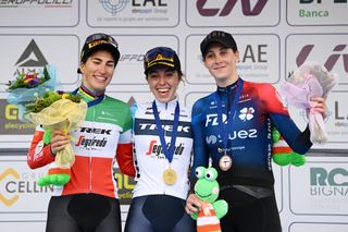CITTIGLIO ITALY MARCH 19 LR Elisa Balsamo of Italy and Team Trek Segafredo on second place race winner Shirin Van Anrooij of The Netherlands and Team Trek Segafredo and Vittoria Guazzini of Italy and Team FDJ SUEZ on third place pose on the podium ceremony after the 24th Trofeo Alfredo BindaComune di Cittiglio 2023 Womens Elite a 139km one day race from Maccagno con Pino e Veddasca to Cittiglio UCIWWT on March 19 2023 in Cittiglio Italy Photo by Dario BelingheriGetty Images