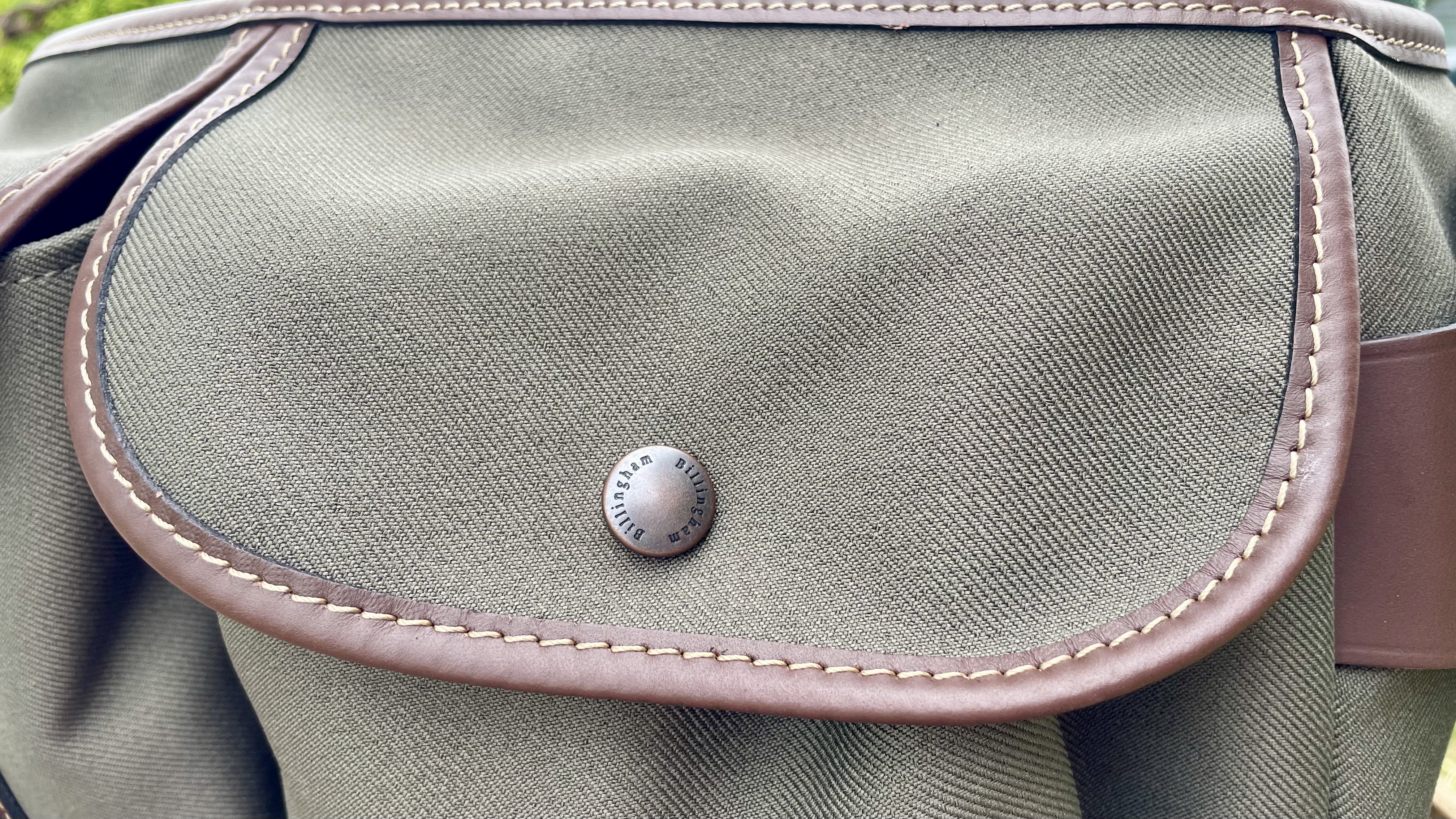 Billingham Hadley Pro 2020 camera bag outdoors on a park bench