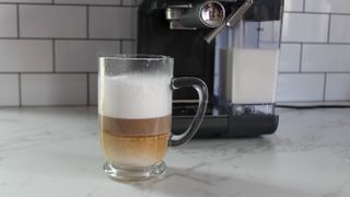 making a latte with the Mr. Coffee One-Touch CoffeeHouse+