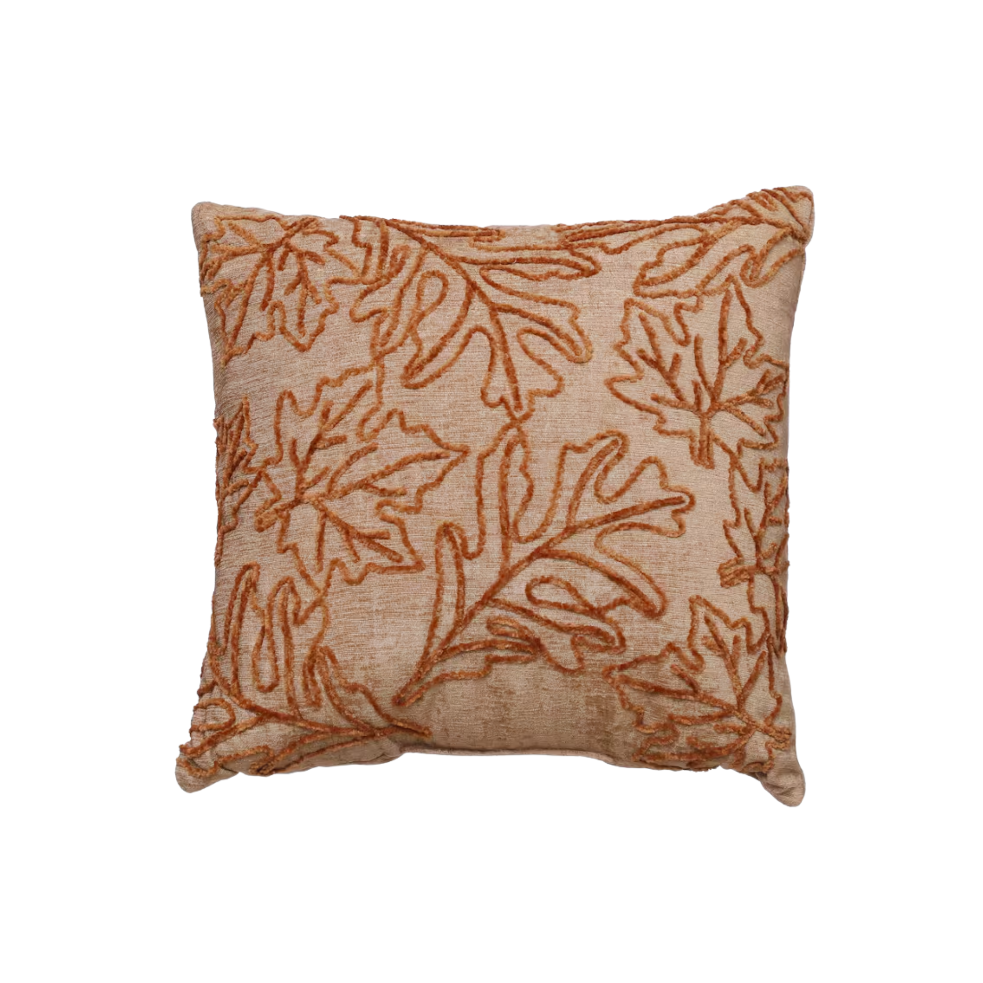 a pillow with leaves on it