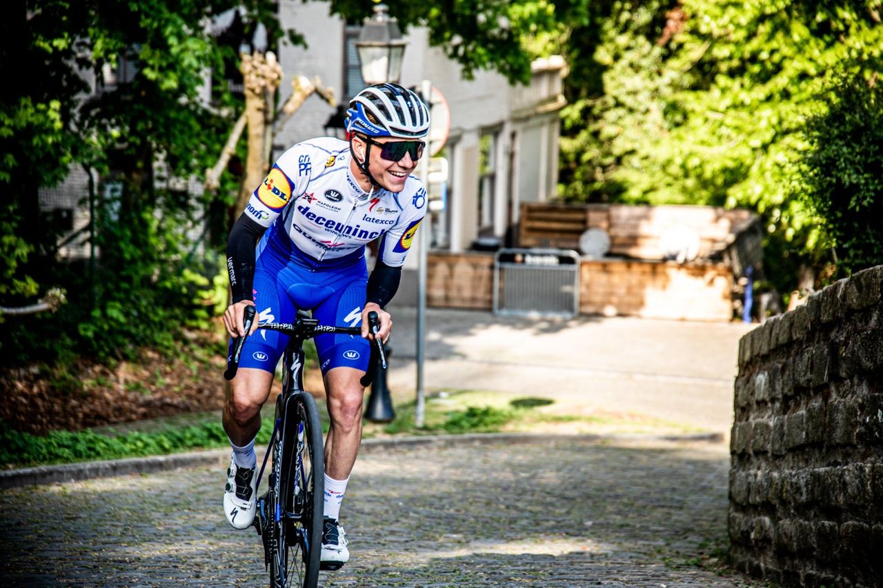 Remco Evenepoel climbing the Muur van Geraardsbergen