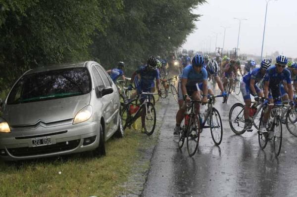 Riders stop to shelter from the rain
