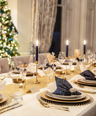 The Silent Night Christmas tablescape, featuring indigo and gold decor