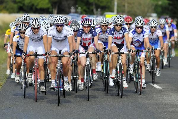 Prime Estate Team and USA National Team lead the peloton.