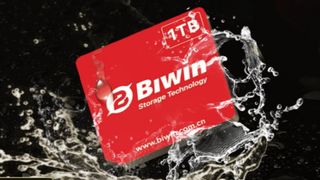 A 1 TB Biwin Mini SSD being splashed with water