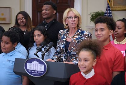 Betsy DeVos and children at White House.