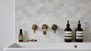 Scalloped-edge bathroom tiles