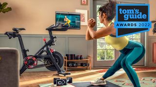 Working out with Peloton Bike+ in a living room