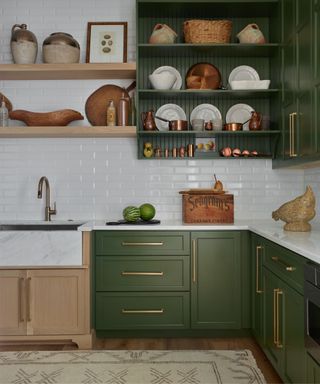 dark green kitchen with brass hardware and rustic decor