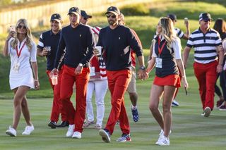 Berger and Johnson at the Presidents Cup with their girlfriends