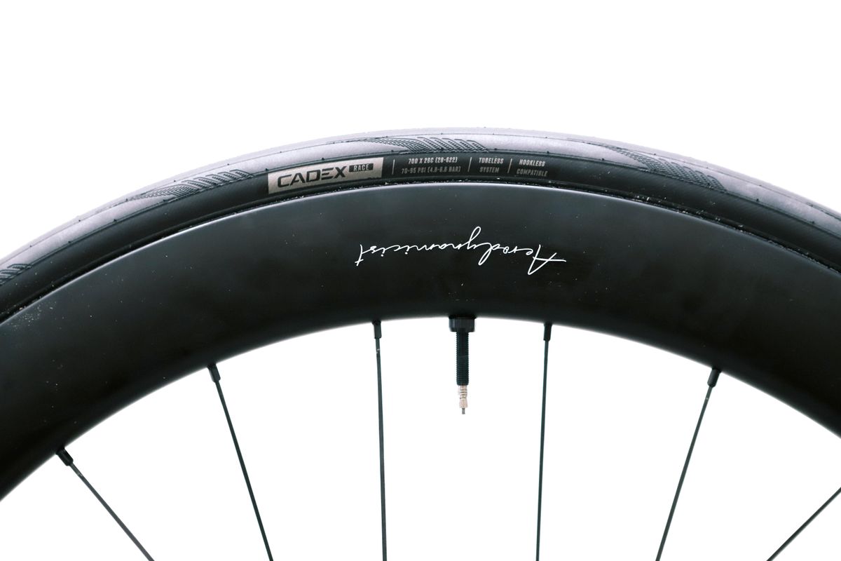 a close up of a black road bike tyre