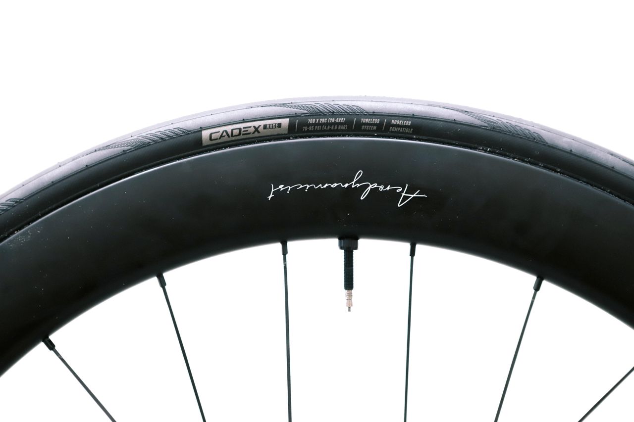a close up of a black road bike tyre