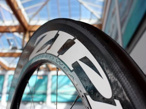 The Firecrest profile is indeed unusual looking with its nearly slab-flat sides and very blunt nose but Zipp says it's far better at maintaining smooth airflow at higher yaw angles than the old toroidal profile.