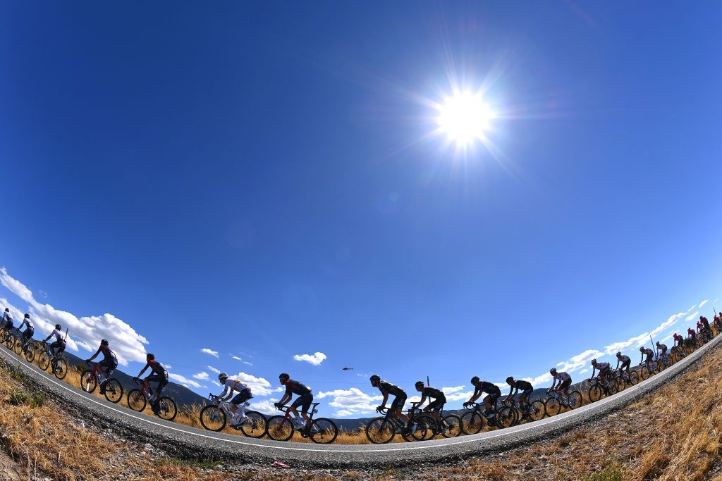 NAVACERRADA SPAIN SEPTEMBER 10 A general view of the peloton competing during the 77th Tour of Spain 2022 Stage 20 a 181km stage from Moralzarzal to Puerto de Navacerrada 1851m LaVuelta22 WorldTour on September 10 2022 in Puerto de Navacerrada Spain Photo by Tim de WaeleGetty Images