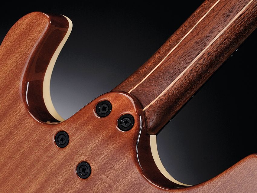 The GTM6's maple-mahogany neck bolts to a tapered heel for easy access.