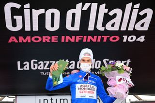 MONTE ZONCOLAN ITALY MAY 22 Geoffrey Bouchard of France and AG2R Citren Team Blue Mountain Jersey celebrates at podium during the 104th Giro dItalia 2021 Stage 14 a 205km stage from Cittadella to Monte Zoncolan 1730m UCIworldtour girodiitalia Giro on May 22 2021 in Monte Zoncolan Italy Photo by Stuart FranklinGetty Images