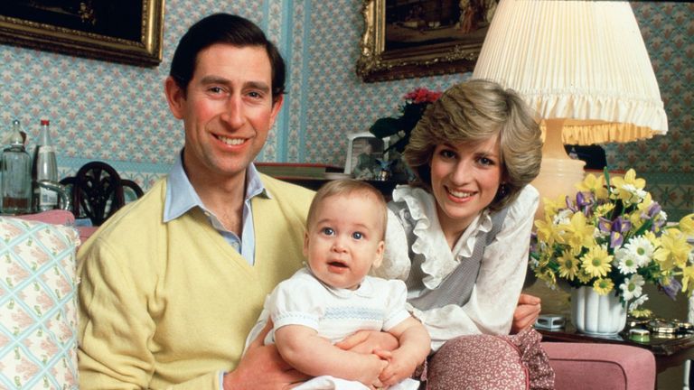 Prince Charles, Prince of Wales and Diana, Princess of Wales with their baby son, Prince William, at home in Kensington Palace