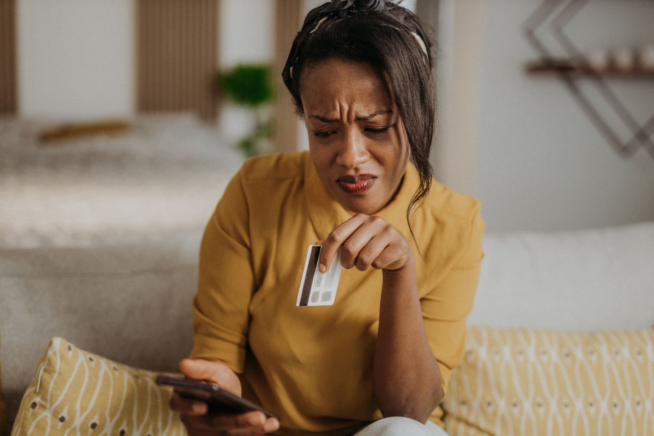 A woman with a credit card.