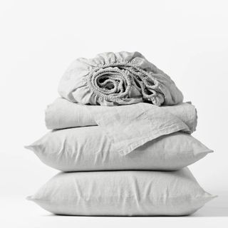 Coyuchi Organic Relaxed Linen Sheets against a white background.