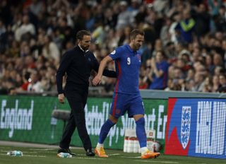 Gareth Southgate, left, congratulates Harry Kane after his goalscoring outing against Switzerland