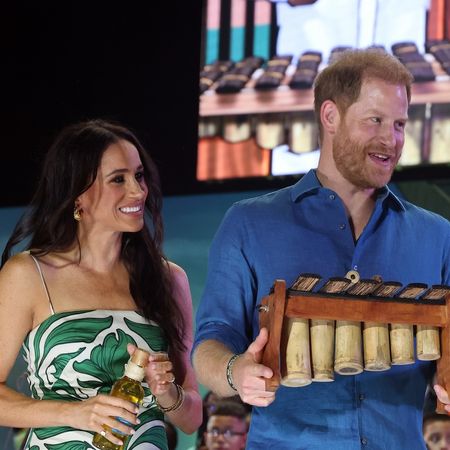 Meghan Markle wearing a green and white drop-waist dress in Colombia August 2024