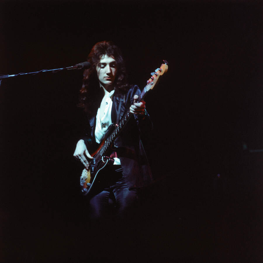 John Deacon onstage