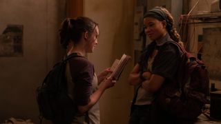 Ellie (Bella Ramsey) reading to Riley (Storm Reid) from her book in The LAst Of Us