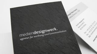 Mediendesignwerk’s business cards fuse luxurious materials with sophisticated printing techniques