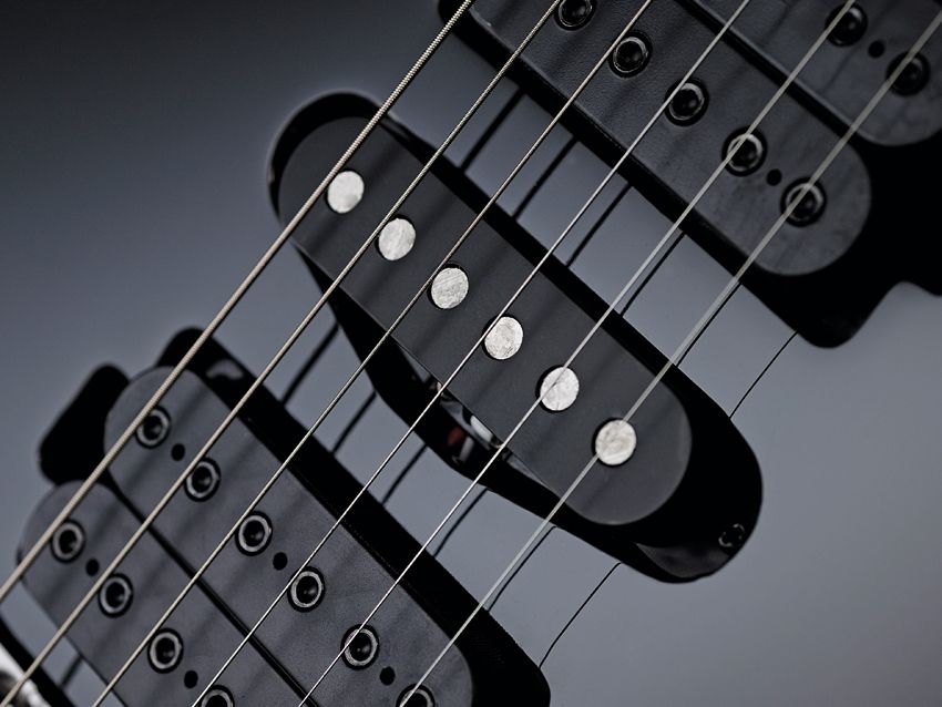 The DiMarzio pickups are replaced with Ibanez CAP-VM units.