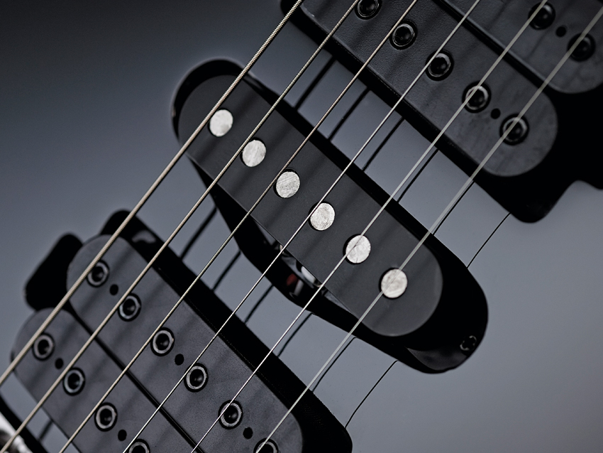 The DiMarzio pickups are replaced with Ibanez CAP-VM units.