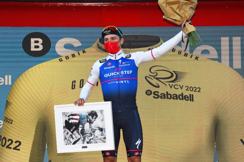 TORRALBA DEL PINAR SPAIN FEBRUARY 02 Remco Evenepoel of Belgium and Team QuickStep Alpha Vinyl celebrates at podium as stage winner during the 73rd Volta A La Comunitat Valenciana 2022 Stage 1 a 1667km stage from Les Alqueries to Torralba Del Pinar 735m VCV2022 on February 02 2022 in Torralba Del Pinar Spain Photo by Dario BelingheriGetty Images