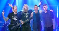 Mastodon pictured after performing on Late Night with Seth Meyers in 2021 [L-R]: Brent Hinds, Troy Sanders, Brann Dailor, and Bill Kelliher.