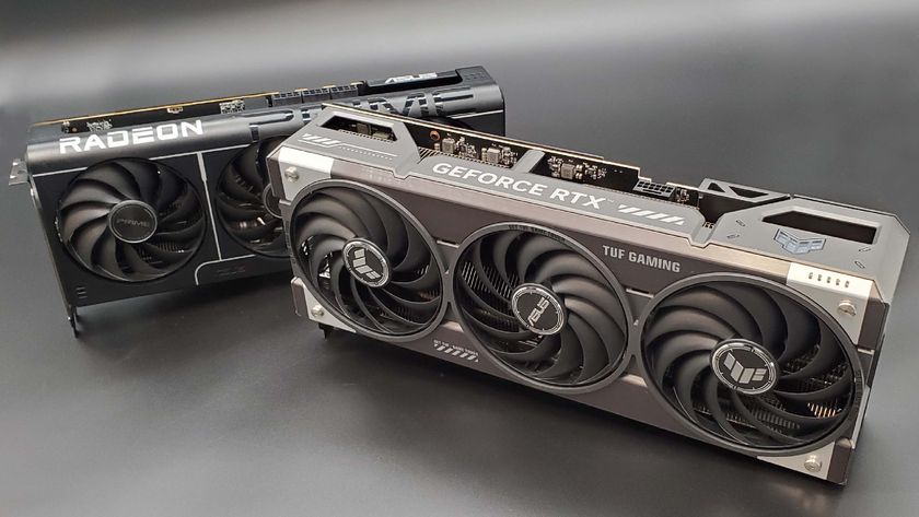 The Asus TUF Gaming RTX 5070 Ti OC Edition in front of the Asus Prime RX 9070 XT on a silver background