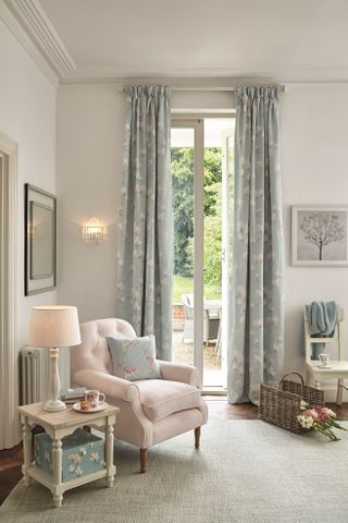 Curtains at a door in a bedroom by Laura Ashley