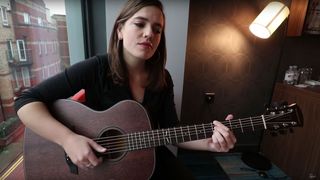 Mary Spender plays an Orangewood acoustic guitar