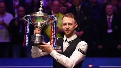 Judd Trump celebrates his victory at the 2019 Betfred World Snooker Championship final