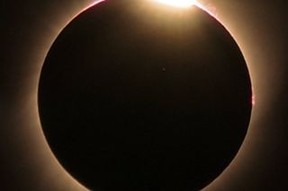 The Great American Solar Eclipse as seen from Wyoming: You can see a solar flare on the upper right quadrant of the sun. This event sparked a nationwide boom in scientific interest, with people talking about the eclipse, searching for information about the event, and reading stories and articles about it.
