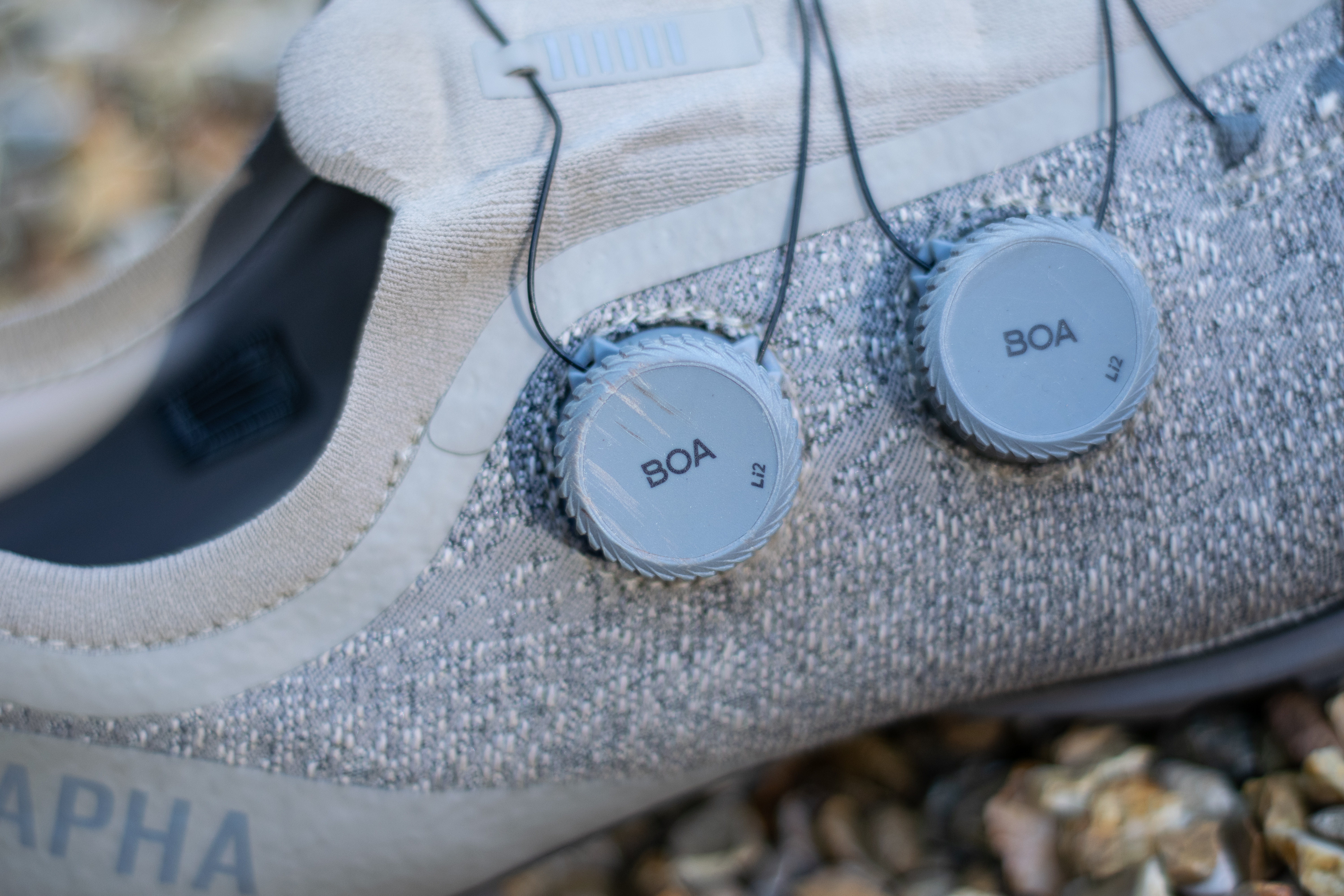 A pair of Rapha Pro Team Gravel covered in mud