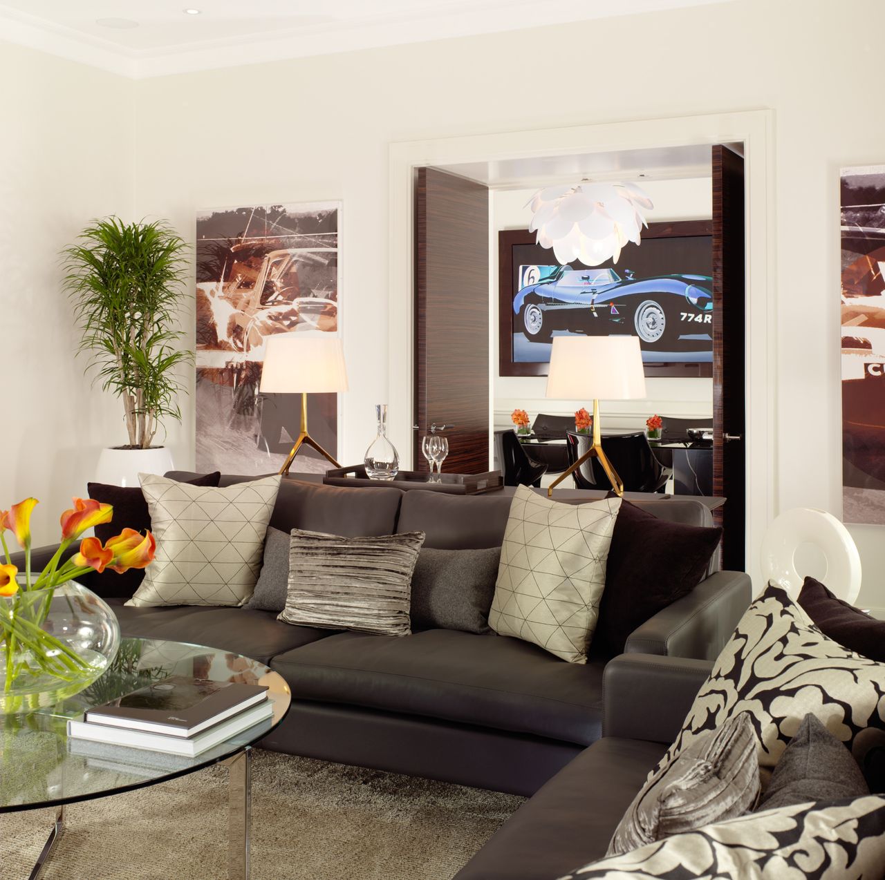 Living room at Callum suite, featuring more pictures of jaaaaaaags and some grey furniture