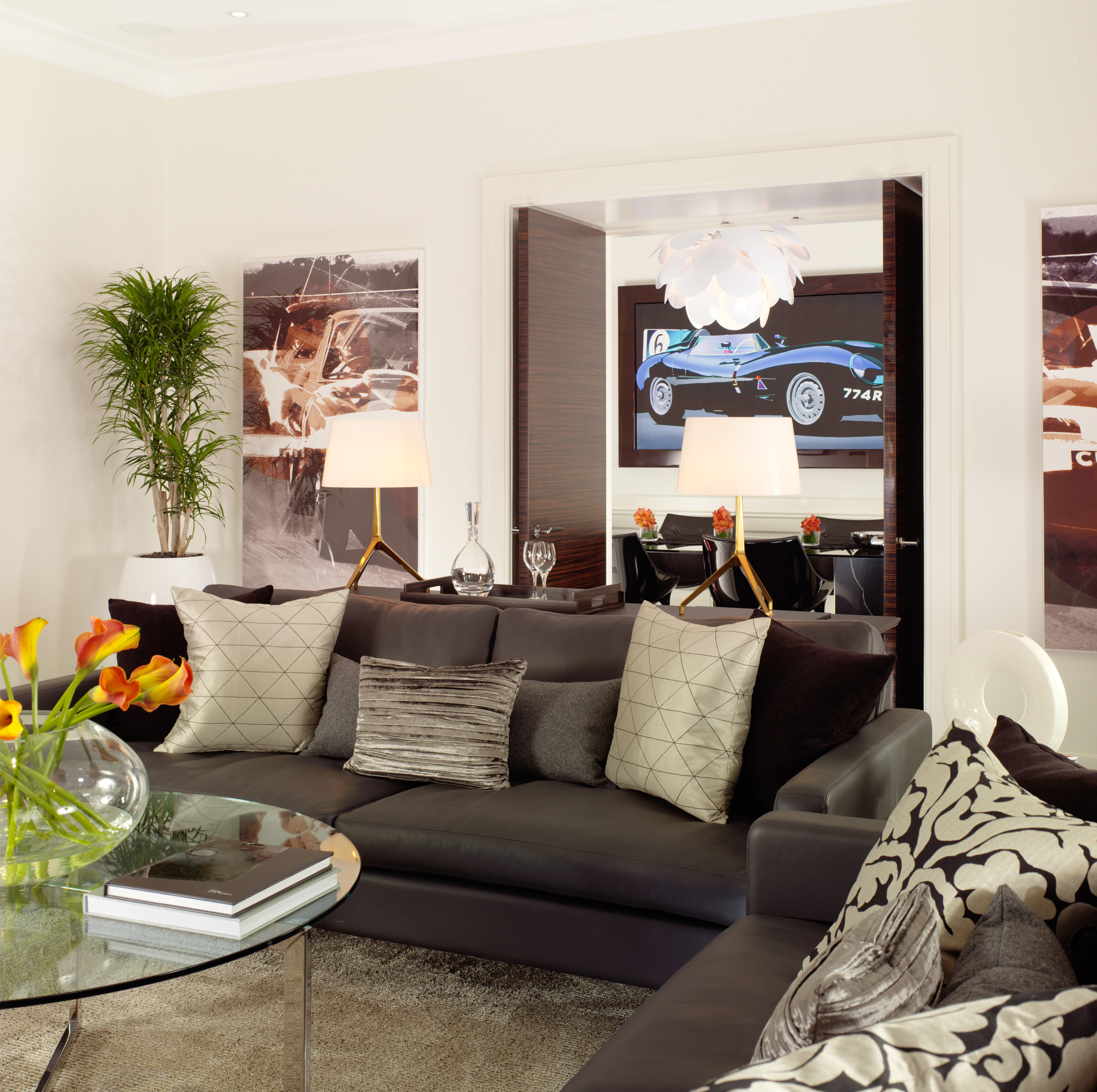 Living room at Callum suite, featuring more pictures of jaaaaaaags and some grey furniture