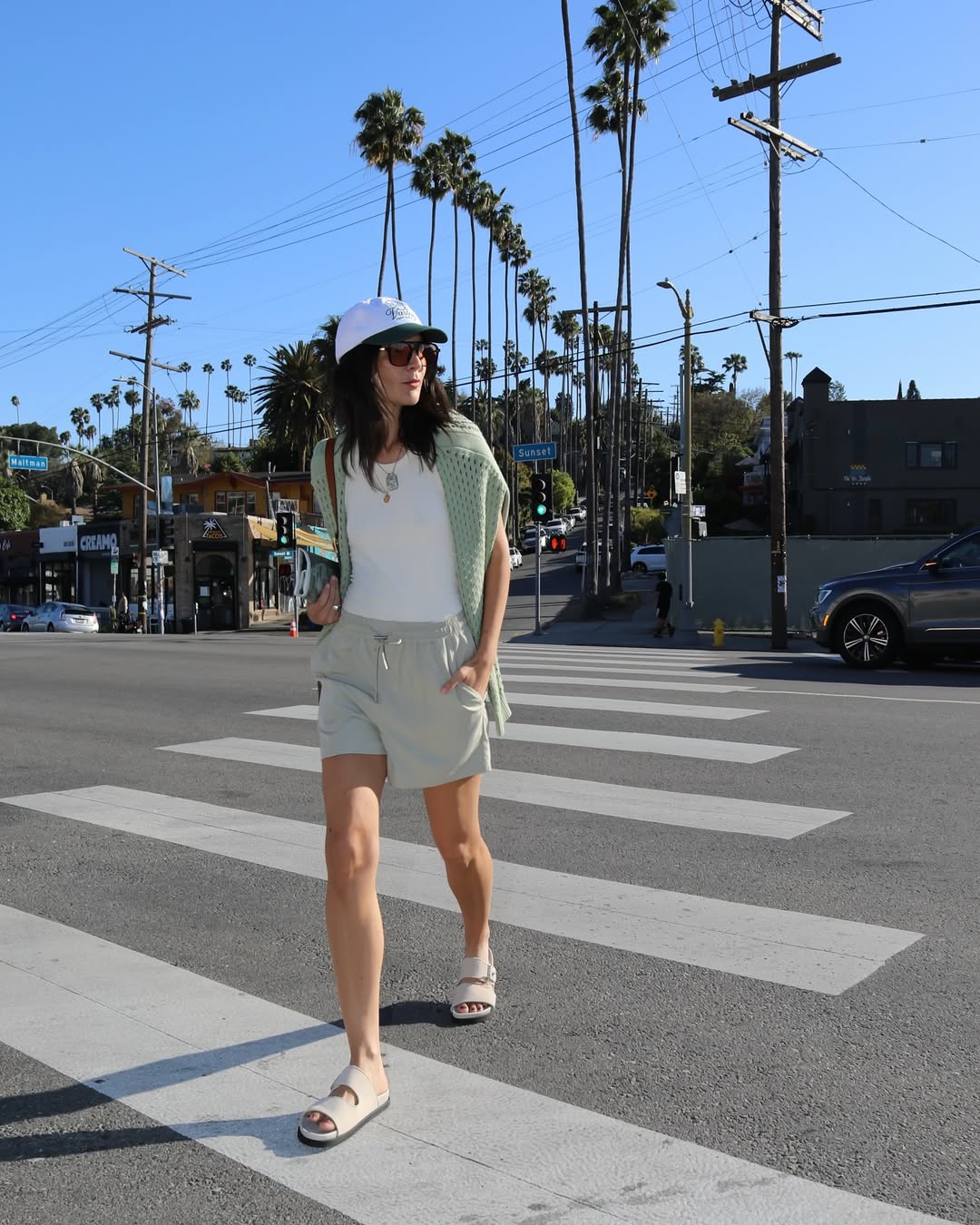 Laura Angelone in buckle slides