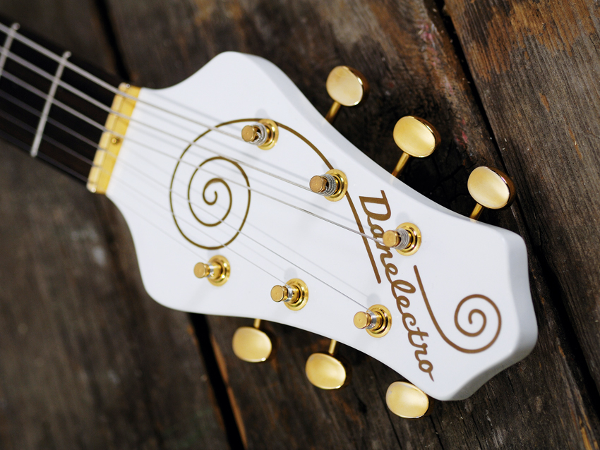 The Single Cutaway's oversized headstock sets it apart.