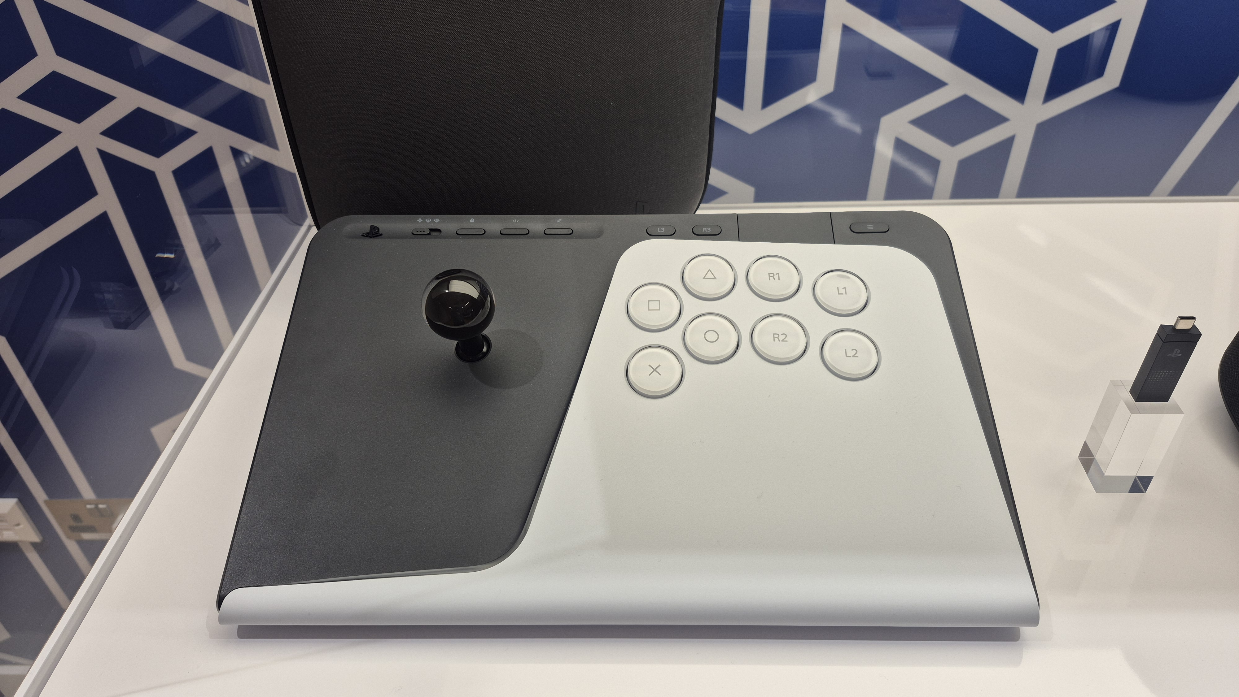 FlexStrike Wireless Fight Stick in cabinet with PlayStation Link dongle