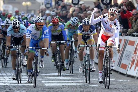 Alexander Kristoff (Katusha) races to a stage win on the cobbled road.