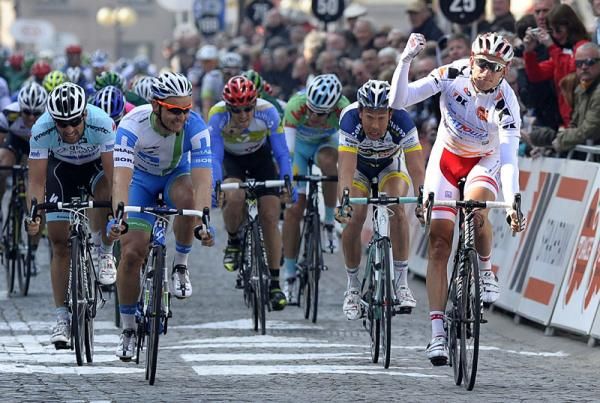 Alexander Kristoff (Katusha) races to a stage win on the cobbled road.