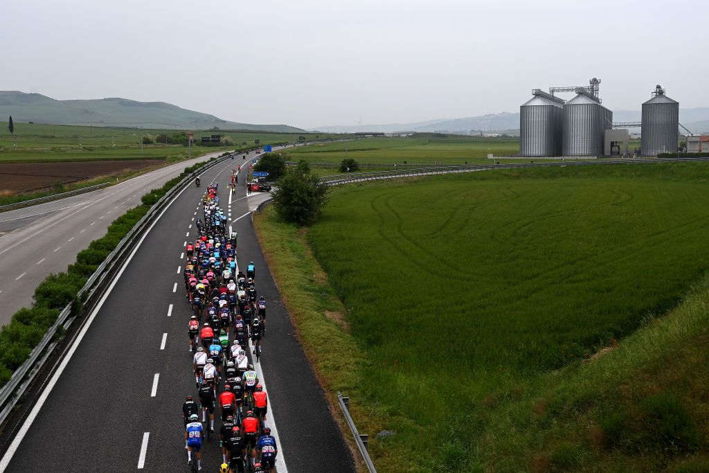 MELFI ITALY MAY 08 A general view of the peloton passing through a landscape during the 106th Giro dItalia 2023 Stage 3 a 213km stage from Vasto to Melfi 532m UCIWT on May 08 2023 in Melfi Italy Photo by Tim de WaeleGetty Images